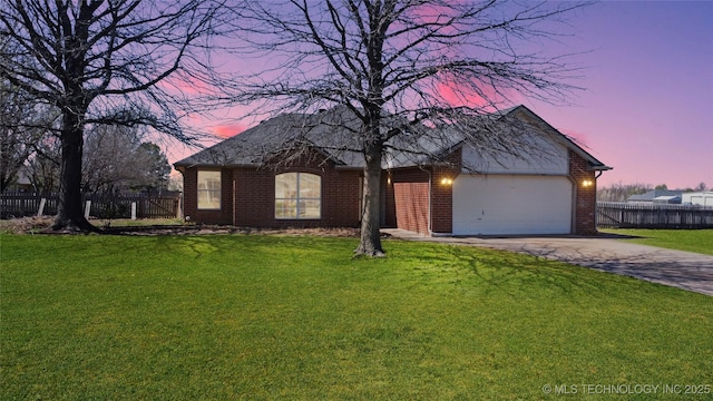 ranch-style house with brick siding, concrete driveway, a garage, and fence