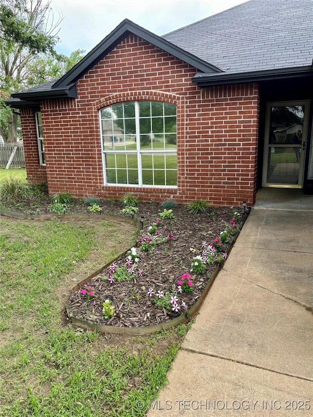 11762 N 156th E Ave, Collinsville, OK 74021 - entrance to property with brick siding and a shingled roof