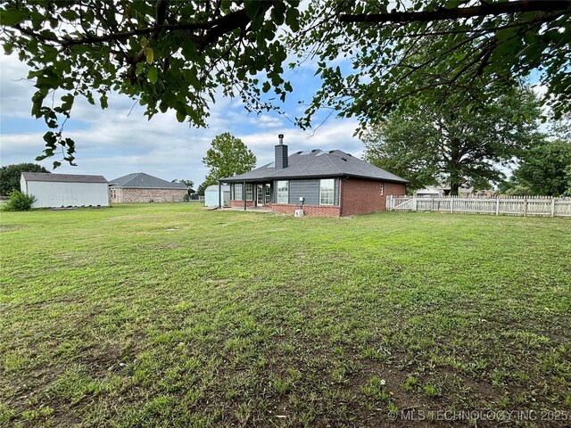 11762 N 156th E Ave, Collinsville, OK 74021 - view of yard with a sunroom