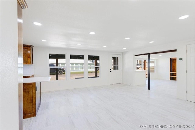 62 Jolene Reid Rd, Mead, OK 73449 - unfurnished living room featuring recessed lighting
