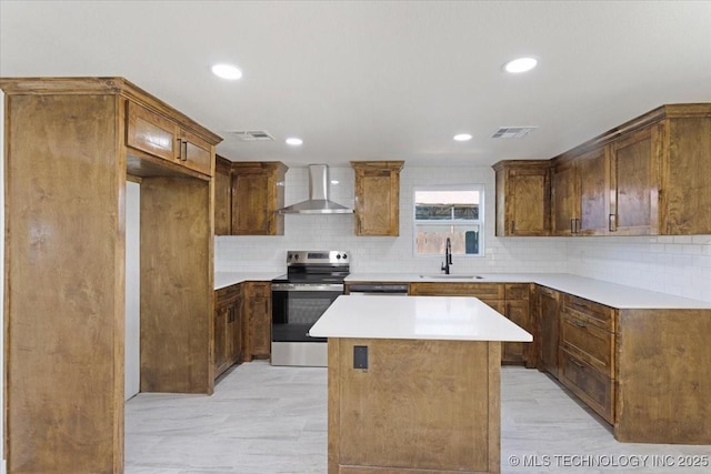 62 Jolene Reid Rd, Mead, OK 73449 - kitchen with wall chimney exhaust hood, electric stove, visible vents, and a sink