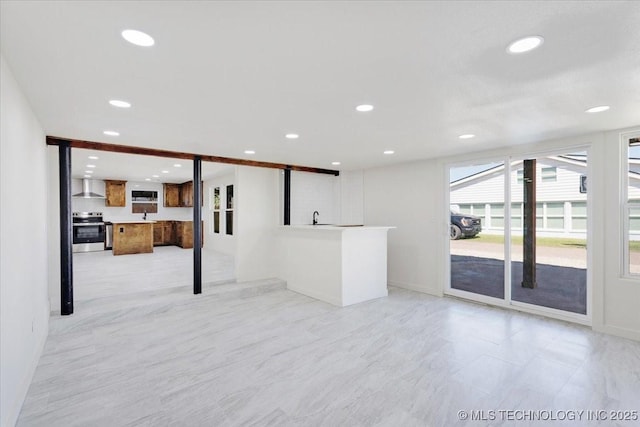 62 Jolene Reid Rd, Mead, OK 73449 - unfurnished living room with recessed lighting and baseboards