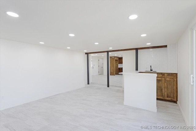 62 Jolene Reid Rd, Mead, OK 73449 - finished below grade area featuring recessed lighting, wet bar, and a sink