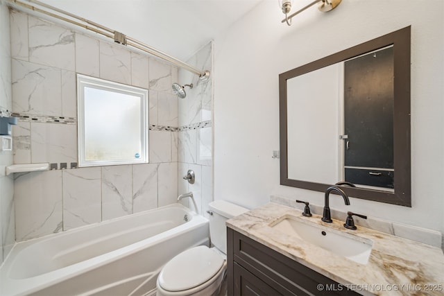 full bathroom featuring vanity, toilet, and bathing tub / shower combination