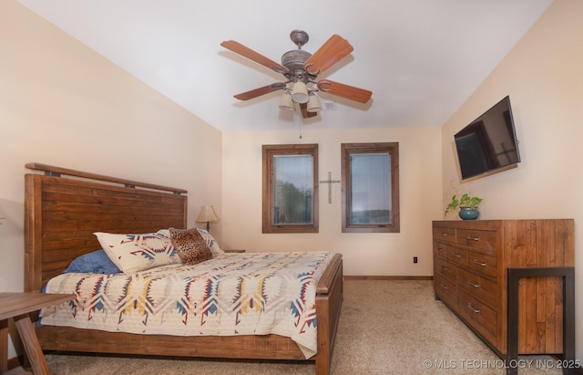 358653 E 5700th Rd, Jennings, OK 74038 - bedroom featuring baseboards, light colored carpet, and ceiling fan