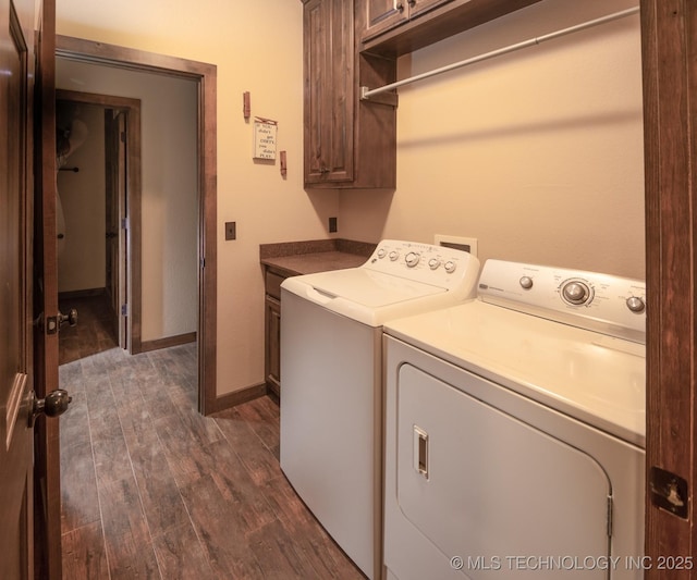 358653 E 5700th Rd, Jennings, OK 74038 - clothes washing area with dark wood finished floors, separate washer and dryer, baseboards, and cabinet space