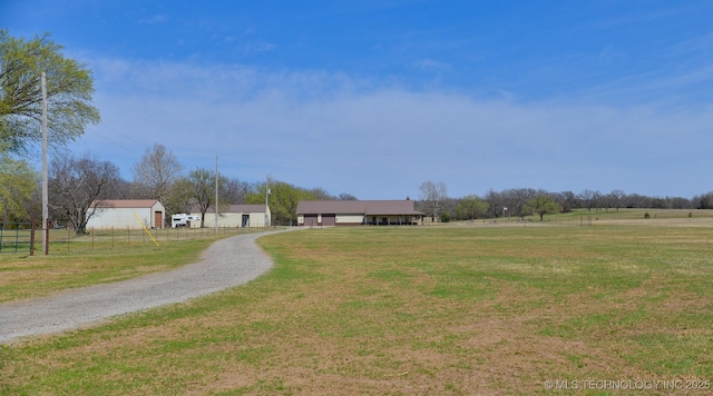 358653 E 5700th Rd, Jennings, OK 74038 - exterior space featuring a front lawn, fence, a rural view, and gravel driveway