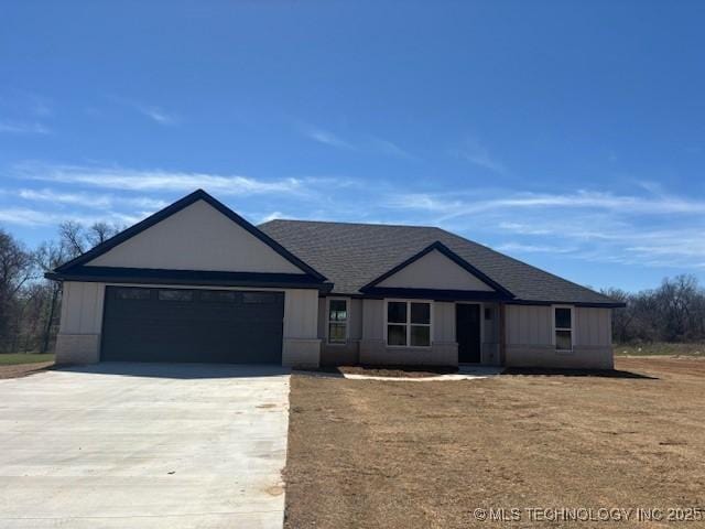 3995 Folsom Rd, Durant, OK 74701 - ranch-style house featuring driveway and an attached garage