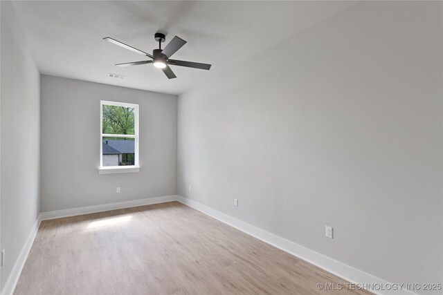 3995 Folsom Rd, Durant, OK 74701 - empty room featuring light wood finished floors, a ceiling fan, and baseboards