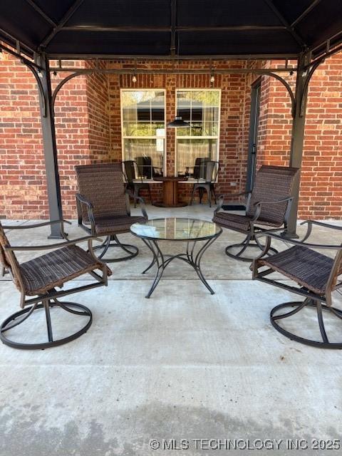 142 Elm St, Mannford, OK 74044 - view of patio featuring a gazebo