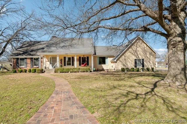 108 S Bettes Ave, Wagoner, OK 74467 - view of front of property featuring a front lawn