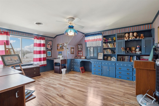 108 S Bettes Ave, Wagoner, OK 74467 - office space with visible vents, a ceiling fan, and wood finished floors