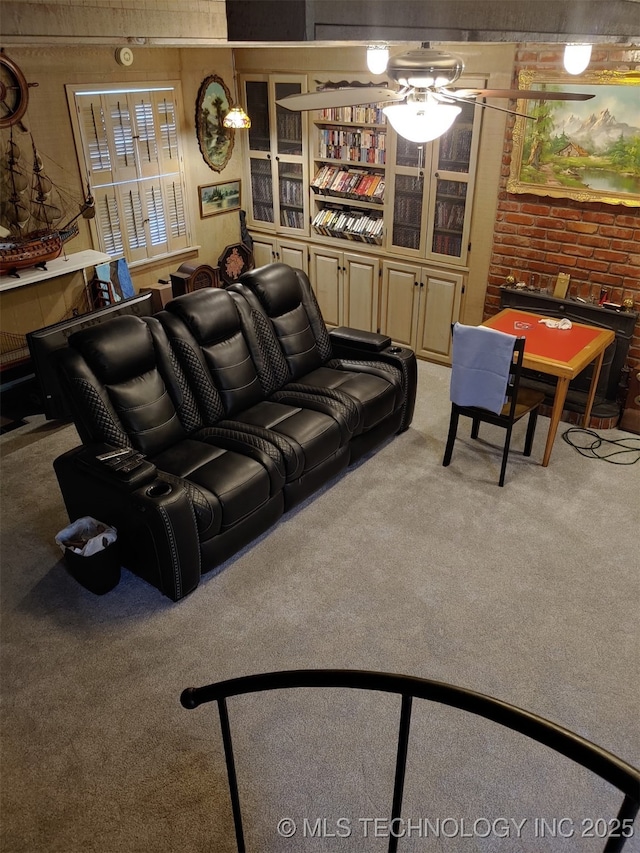 108 S Bettes Ave, Wagoner, OK 74467 - living room with carpet floors and a ceiling fan