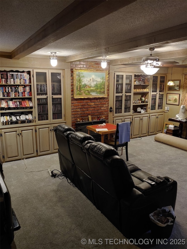 108 S Bettes Ave, Wagoner, OK 74467 - living room featuring light carpet, beamed ceiling, and a textured ceiling
