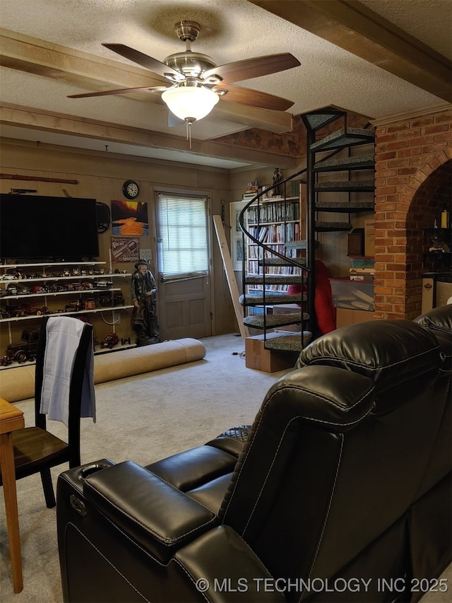 108 S Bettes Ave, Wagoner, OK 74467 - living area with a textured ceiling, ceiling fan, stairway, and carpet