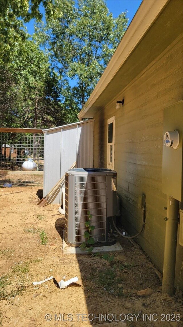 6111 County Road 3605, Ada, OK 74820 - view of yard featuring central air condition unit