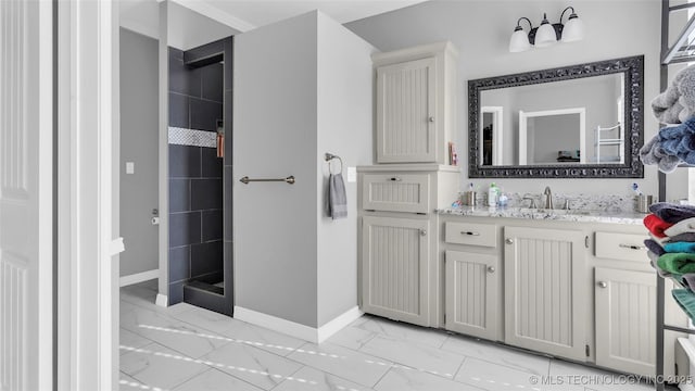 76 Cris, Durant, OK 74701 - full bath featuring marble look tile flooring, baseboards, vanity, and tiled shower