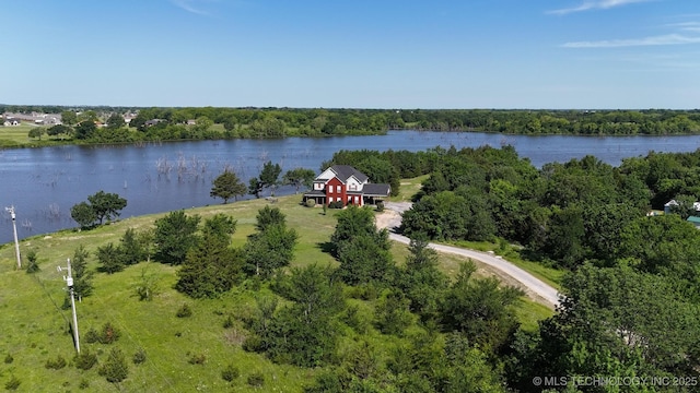 76 Cris, Durant, OK 74701 - aerial view of a large body of water and a heavily wooded area
