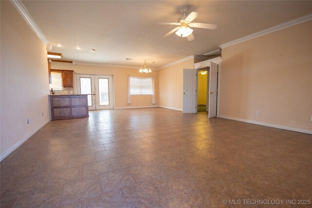 2 Aspen, Davis, OK 73030 - unfurnished living room featuring ceiling fan with notable chandelier, crown molding, and baseboards