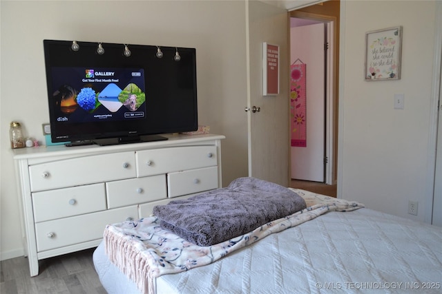 17414 Bridgeview Rd, Madill, OK 73446 - bedroom with wood finished floors
