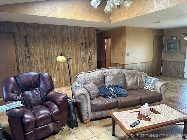 tiled living area with wood walls and wainscoting