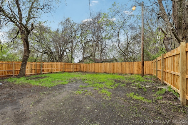 719 S 7th St, Muskogee, OK 74401 - view of fenced backyard