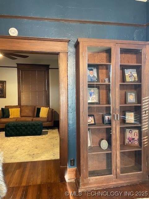 121 F SW, Ardmore, OK 73401 - detailed view of wood finished floors and a ceiling fan
