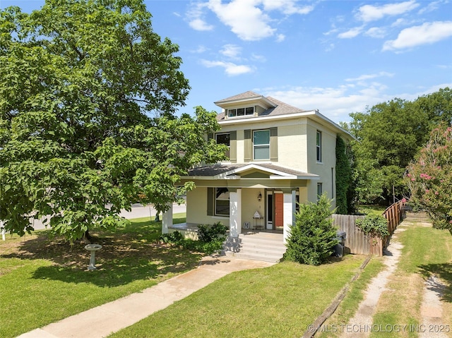 121 F SW, Ardmore, OK 73401 - american foursquare style home featuring covered porch and brick siding