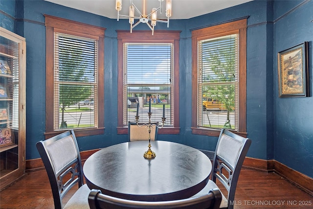 121 F SW, Ardmore, OK 73401 - dining space with a chandelier, wood finished floors, and healthy amount of natural light