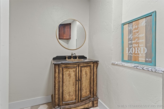 121 F SW, Ardmore, OK 73401 - bathroom with vanity and baseboards