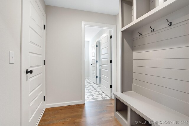 23192 E 106th St S, Broken Arrow, OK 74014 - mudroom featuring baseboards and wood finished floors