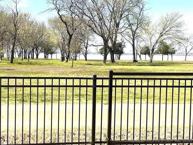 2828 Riverview Rd, Kingston, OK 73439 - view of yard with fence and a water view