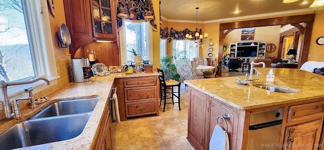 23280 E Horseshoe Bend Rd, Park Hill, OK 74451 - kitchen featuring open floor plan, a chandelier, ornamental molding, light stone counters, and light tile patterned floors
