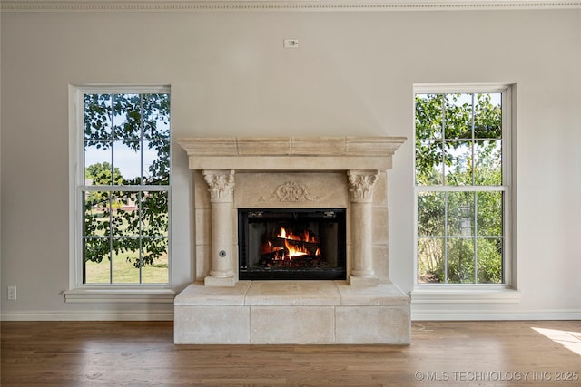 8315 N 99th E Ave, Owasso, OK 74055 - detailed view of a high end fireplace and wood finished floors