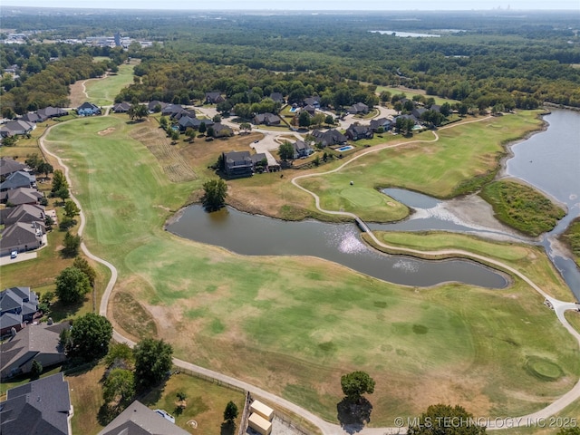 8315 N 99th E Ave, Owasso, OK 74055 - aerial view of property's location with nearby suburban area, a large body of water, and a golf course