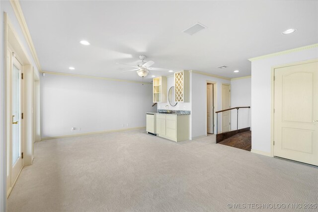 8315 N 99th E Ave, Owasso, OK 74055 - unfurnished living room featuring ornamental molding, recessed lighting, ceiling fan, and light colored carpet