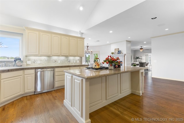 8315 N 99th E Ave, Owasso, OK 74055 - kitchen featuring dishwasher, cream cabinets, a kitchen island, light wood-type flooring, and a chandelier
