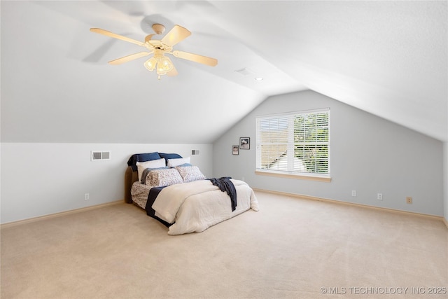 8315 N 99th E Ave, Owasso, OK 74055 - carpeted bedroom with ceiling fan and vaulted ceiling