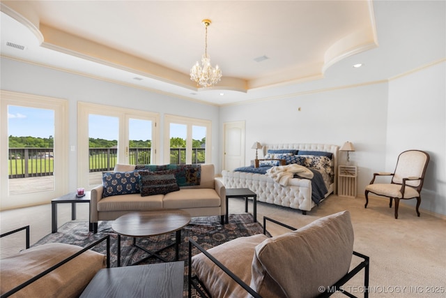 8315 N 99th E Ave, Owasso, OK 74055 - carpeted bedroom featuring access to exterior, a raised ceiling, a chandelier, crown molding, and recessed lighting