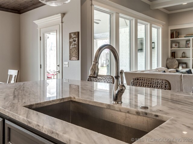 5519 E 123rd St S, Bixby, OK 74008 - kitchen with a sink, light stone countertops, and ornamental molding