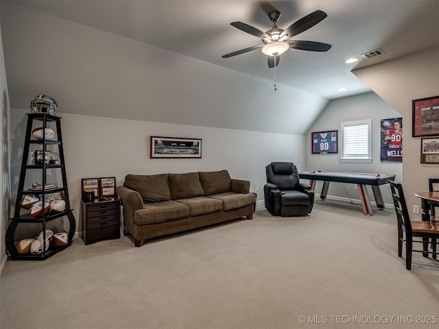 carpeted living area with lofted ceiling, recessed lighting, baseboards, visible vents, and a ceiling fan