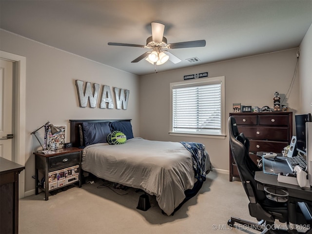 bedroom featuring light colored carpet, visible vents, baseboards, and a ceiling fan
