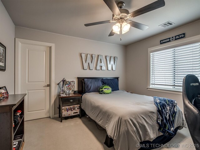 5519 E 123rd St S, Bixby, OK 74008 - bedroom with light colored carpet and ceiling fan
