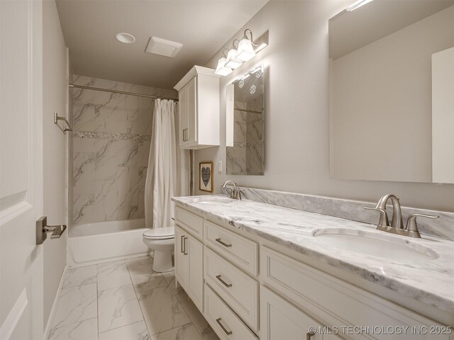 bathroom featuring marble finish floor, a sink, toilet, and shower / bath combo