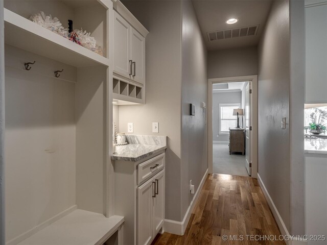 5519 E 123rd St S, Bixby, OK 74008 - mudroom featuring baseboards, wood finished floors, and recessed lighting