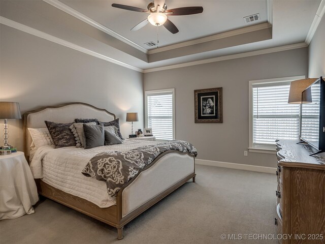 5519 E 123rd St S, Bixby, OK 74008 - bedroom with light colored carpet, a tray ceiling, ornamental molding, baseboards, and a ceiling fan