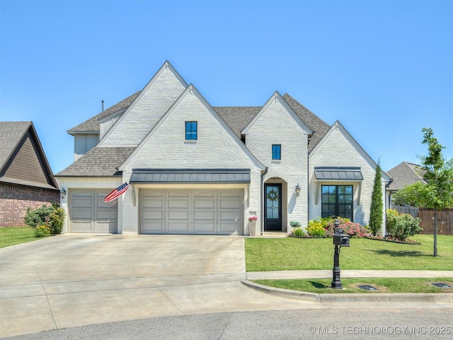 5519 E 123rd St S, Bixby, OK 74008 - french provincial home with driveway, roof with shingles, an attached garage, and brick siding