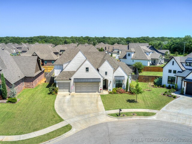 5519 E 123rd St S, Bixby, OK 74008 - french provincial home featuring a residential view, driveway, an attached garage, and a shingled roof