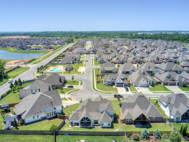 5519 E 123rd St S, Bixby, OK 74008 - aerial view of residential area featuring a nearby body of water and a pool