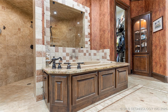 bathroom with a walk in shower and a garden tub